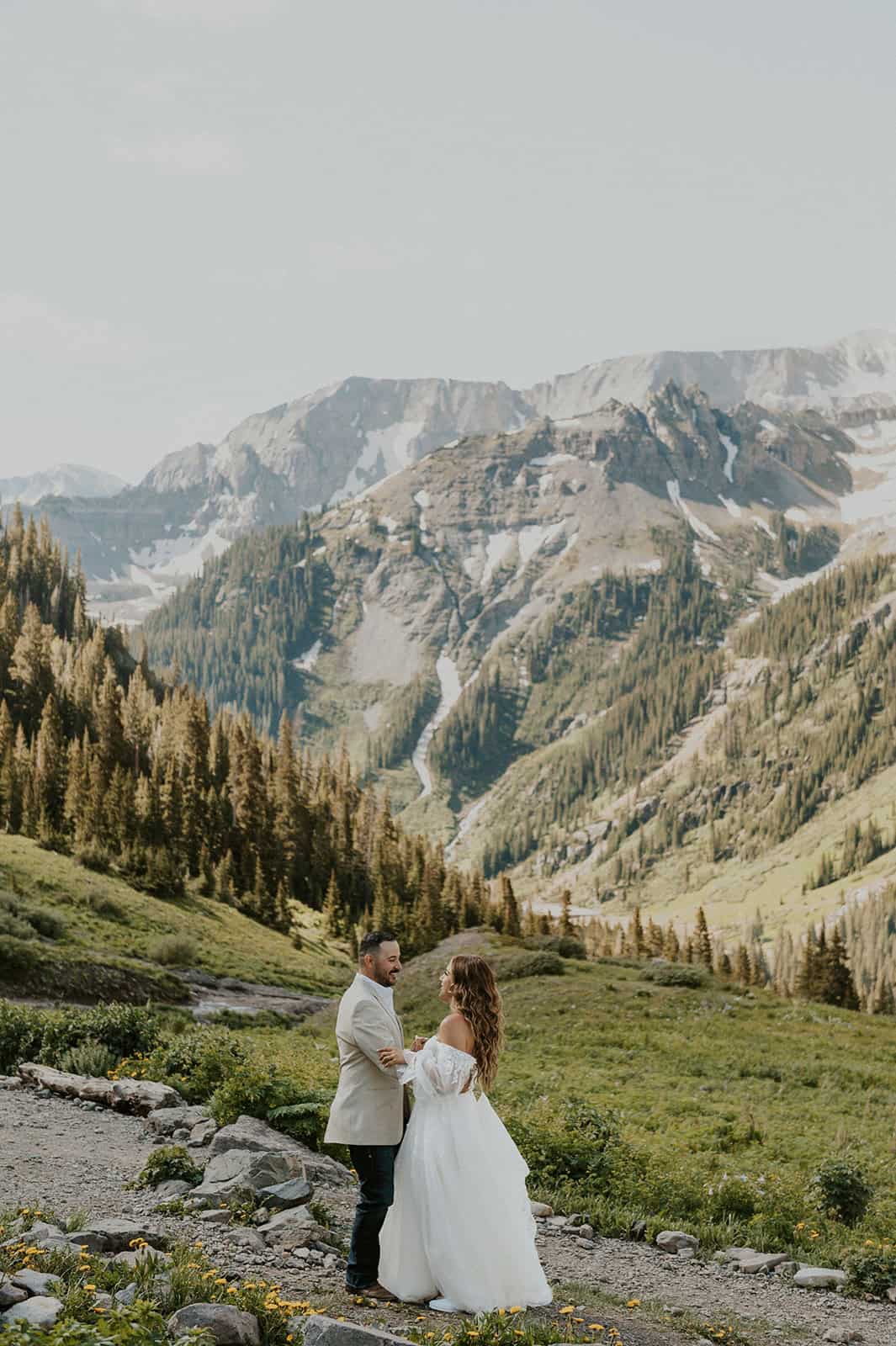 Couple dancing beneath the mountains of Telluride during their off-roading elopement.