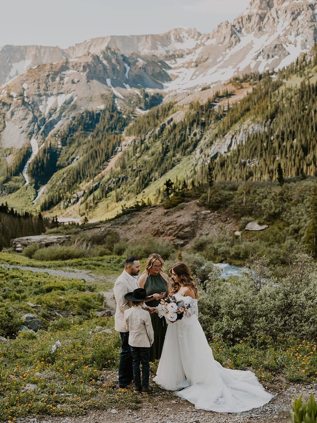 A family eloping in the San Juan Mountains sharing vows with the mountains of Ouray in the background.